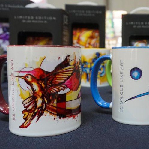 Mugs with the hummingbird motif by Joe Muczka jr.