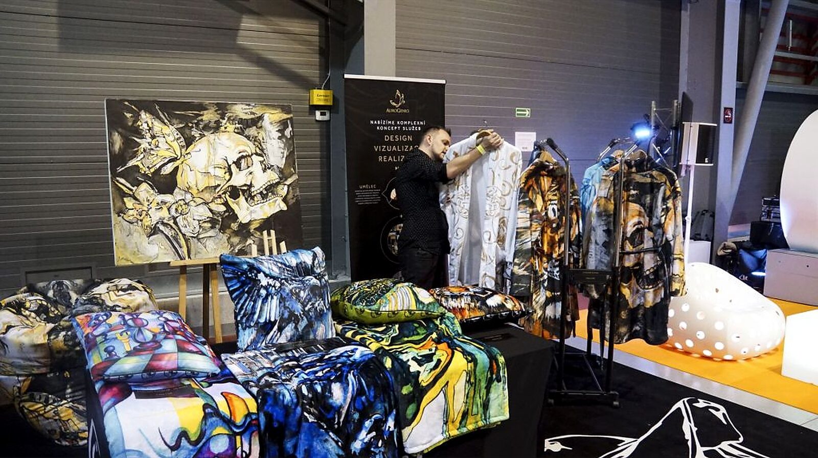 Bed linen and clothing with motifs by Joe Muczka jr. on the stand at 4men expo